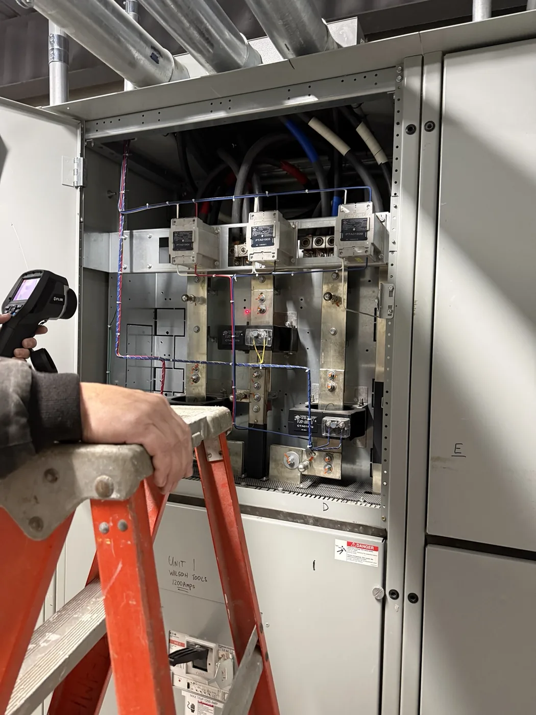 Bragg Electric performing thermal imaging on industrial switchgear